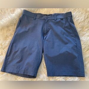 Travis Mathew Men’s Beck Shorts. Size 32. Color is Blue.
Style: 1MM208